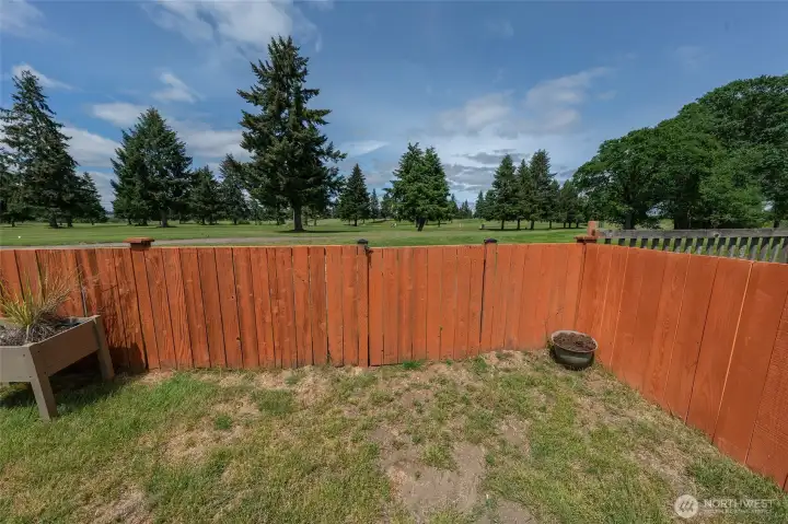 Gate access to the golf course.