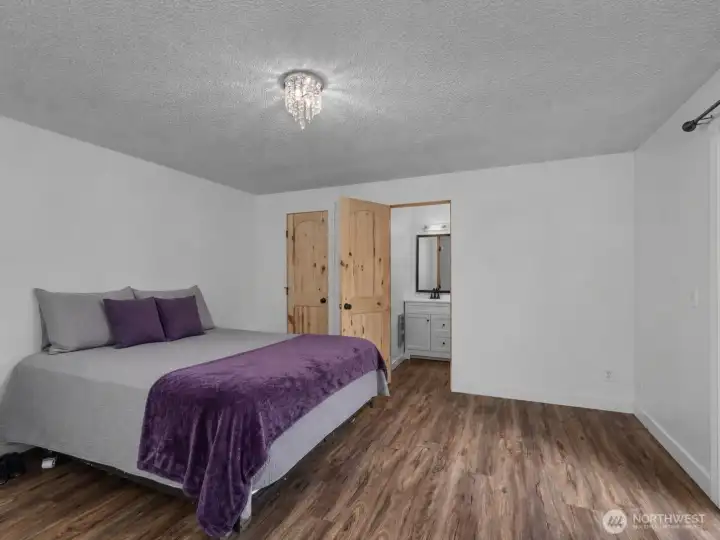 Master - Bed is digitally enhanced.