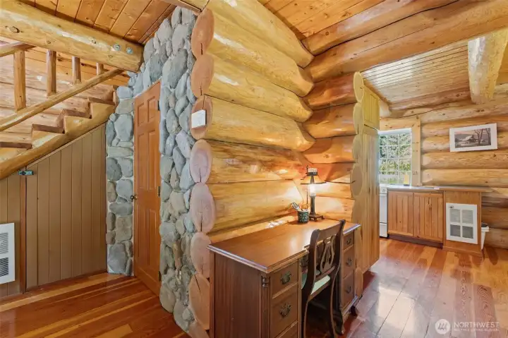 Under stair storage with water heater, bathroom entrance. Under stair storage with water heater, bathroom entrance.