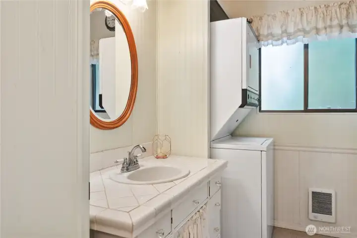 3/4 bath also has stackable washer and dryer.
