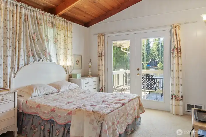 Bedroom looks to the lake.