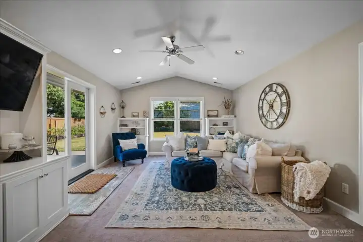 Living room with french doors to patio & views of the backyard