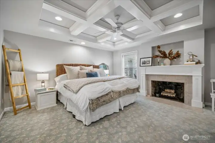 Primary Bedroom with walk in closet & fireplace