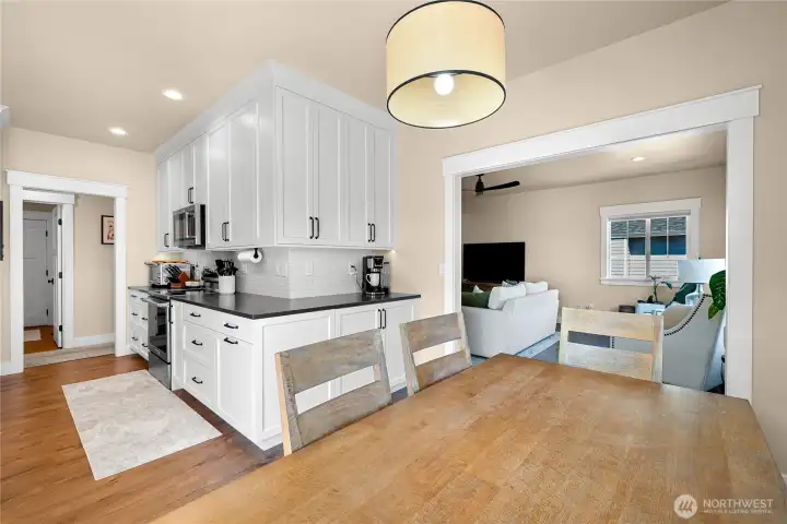 Newley remodeled kitchen with all new appliances, quartz countertops, custom cabinet lighting and molding.