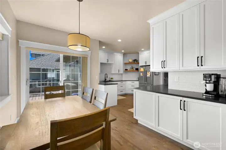 Large sliding door to the back deck with lots of space for your outdoor furniture, BBQ and more.