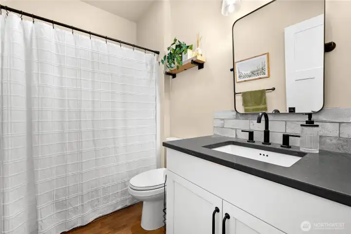 Full beautifully decorated bathroom on main floor.