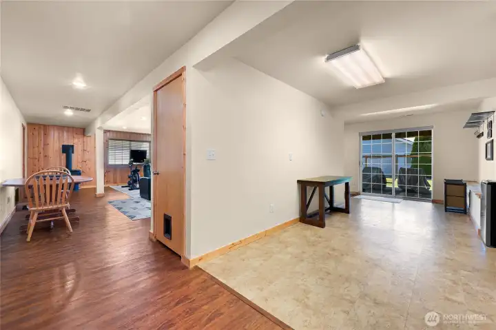 Cozy gas fireplace for the fall and winter nights and sliding door access to the backyard and patio.