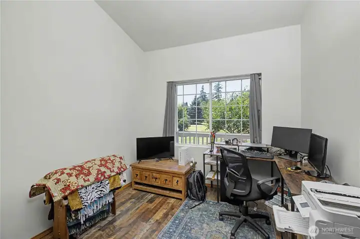 Versatile den with beautiful views of the fruit trees and front yard. Versatile den with beautiful views of the fruit trees and front yard.