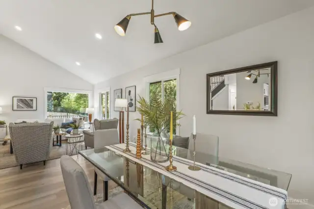 Generous dining area seamlessly connects the living room and kitchen.