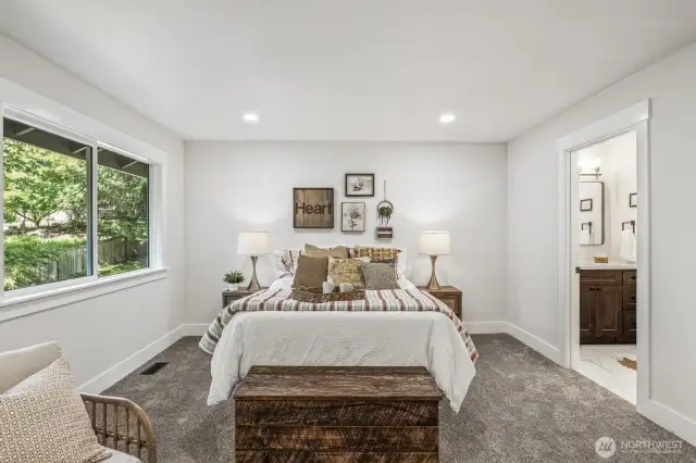 Luxuriously remodeled 3/4 ensuite bathroom off the primary bedroom.