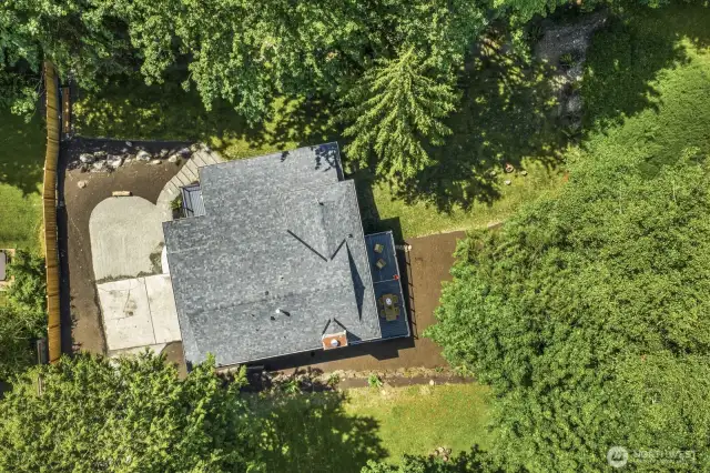 Backs to a lush greenbelt, offering exceptional privacy.