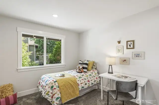 The light-filled fourth bedroom offers a bright and inviting space.