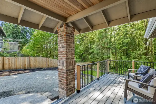Beautiful brick column accents and a spacious covered front porch create a warm and welcoming first impression.