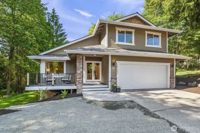 Attached two-car garage plus extra side parking or RV space.