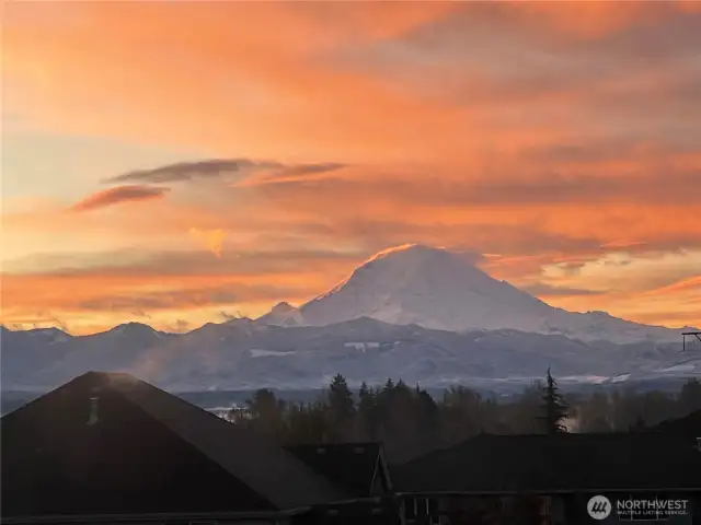 Good Morning Mt. Rainier!  Wake up to this breathtaking view of Mt. Rainier and the surrounding foothills.  Imagine this view from the front of the entire home from dawn to dusk!