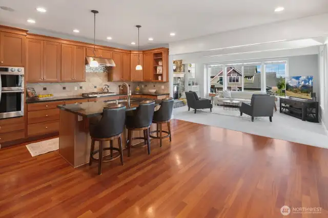 The spacious kitchen features ample cabinet and counter space to accommodate the most discriminating chef!  The open floor plan is perfect for hosting large gatherings and/or everyday life.