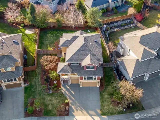 Overview of home shows private backyard.
