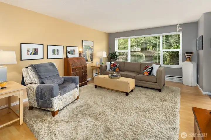 Spacious living room looks out over patio