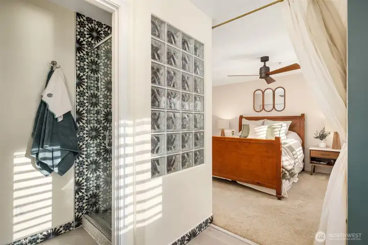 This spa-style bathroom retreat gives directly off the primary bedroom - boutique hotel style.