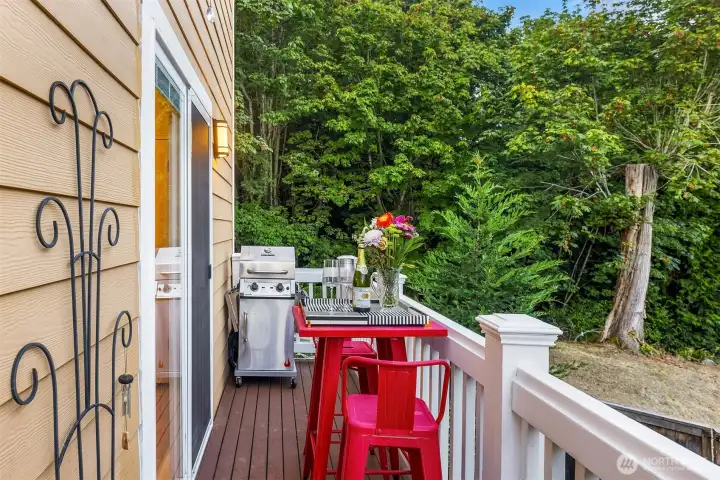 This main floor deck spans the entire length of the main floor. Access it off the kitchen and living room.