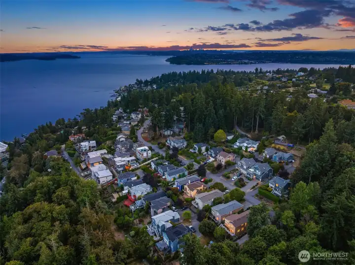 Aerial views of Goat Hill and Juanita Bay beyond, at twilight.