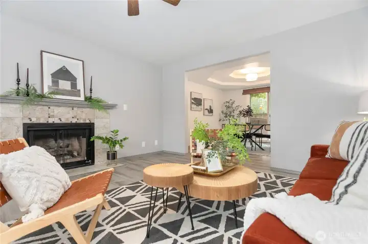 Beautiful tile wrapped wood or gas fireplace and painted mantle!