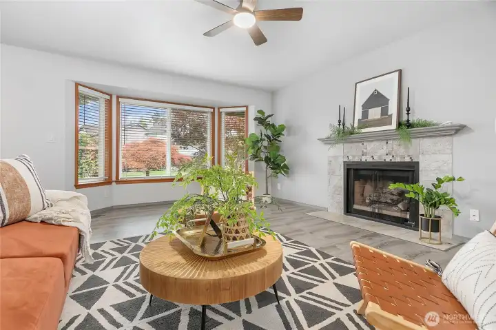 Large bay window letting lots of natural light into the spacious living room