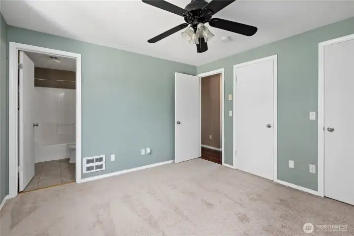 master bedroom with 2 separate closets