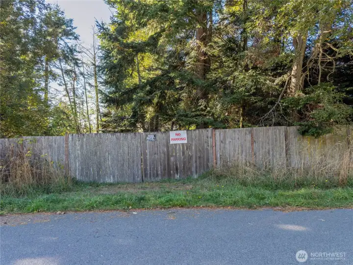 Double gate rear property entry for easy RV parking