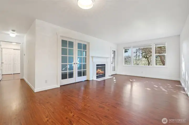 Living room with wood burning fireplace
