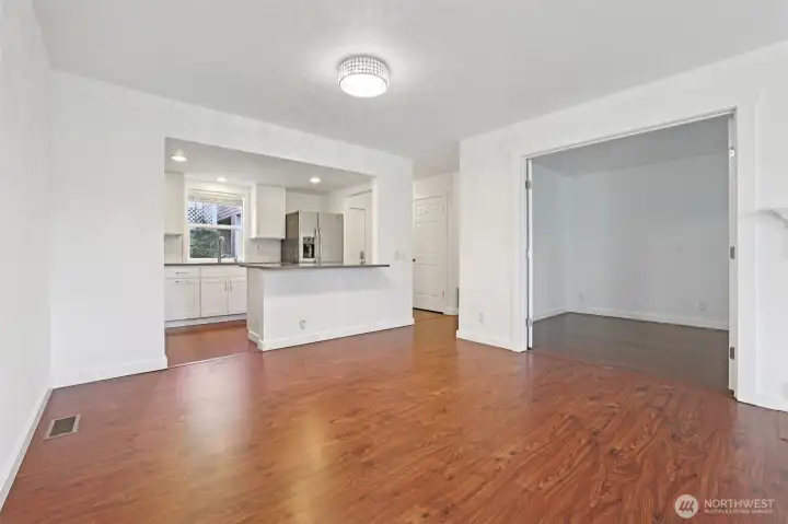 Open to kitchen with Den doors open on the right