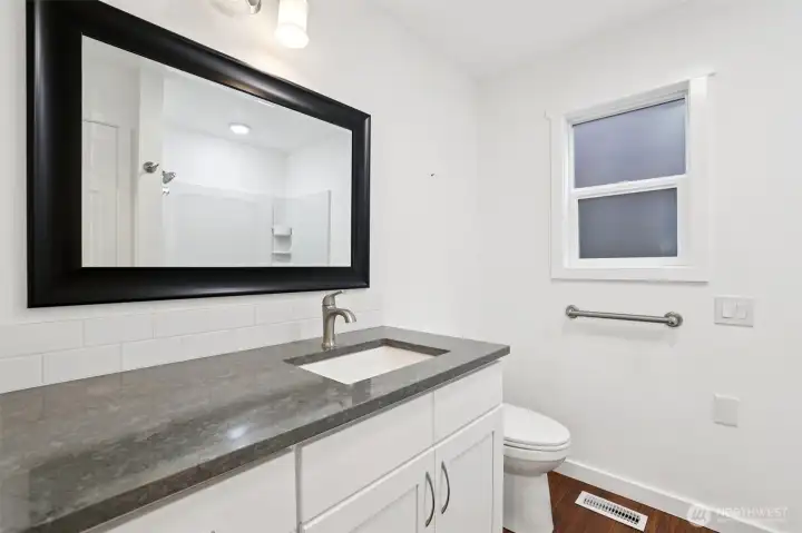 Primary bedroom with updated counters and cabinetry