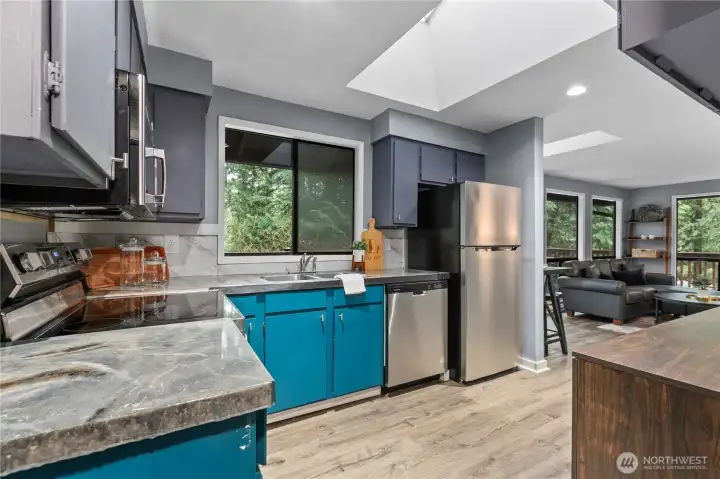 Kitchen with plenty of storage and skylights