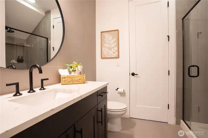 Bathroom with shower down stairs