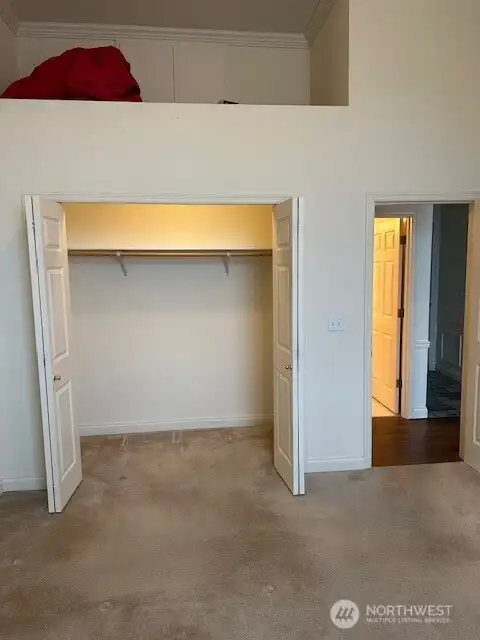 Bedroom with loft storage
