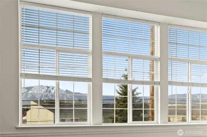 High windows let in light and view of the foot hills in the distance.