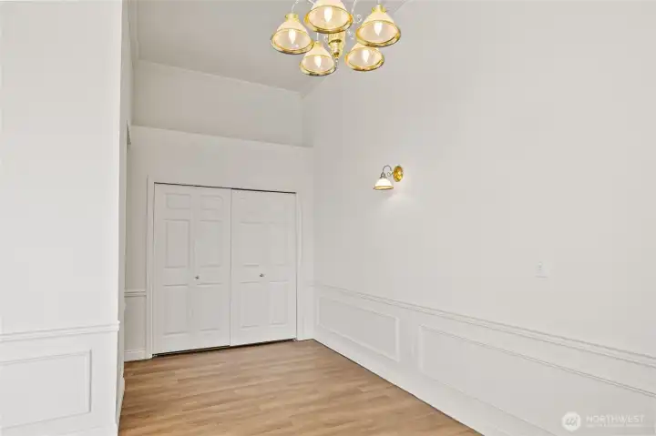 Laundry area behind double doors.