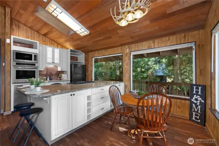 Kitchen with eat-in area and dining room.