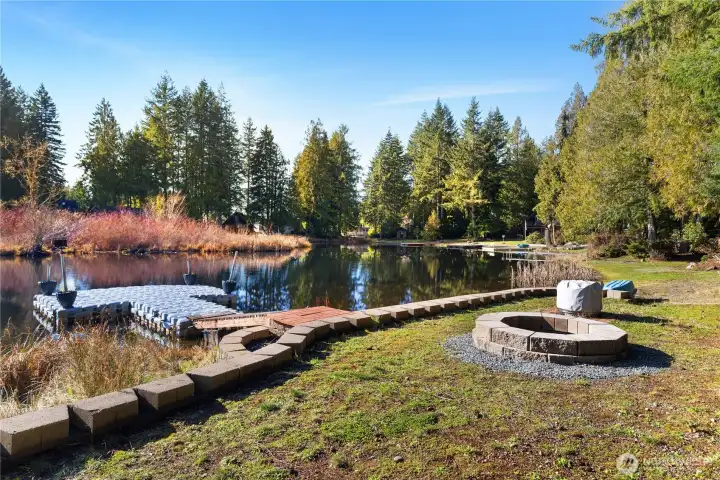 Firepit and retaining wall are in - think about those summer months!