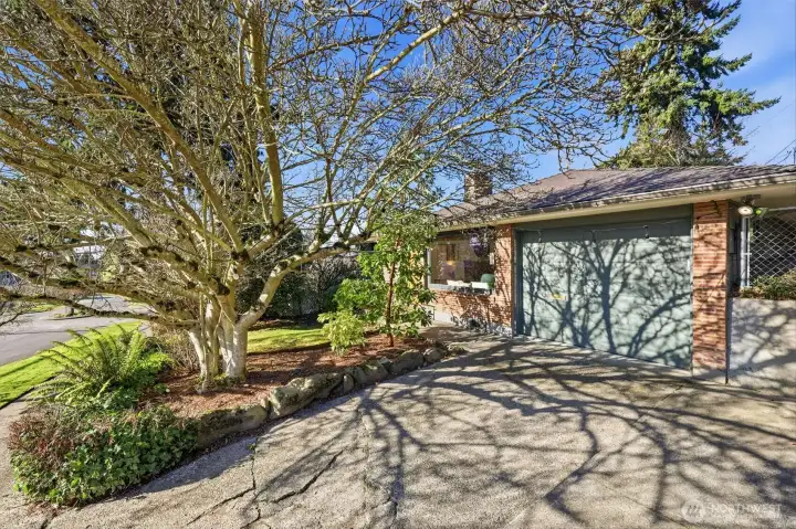 Two parking spaces in the driveway.  New garage door was installed in 2023.