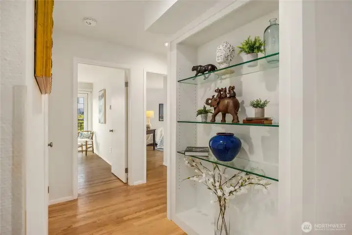Built-in glass display shelves.