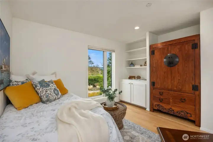 This armoire/tv hutch conveys. (in the past there was a closet here.