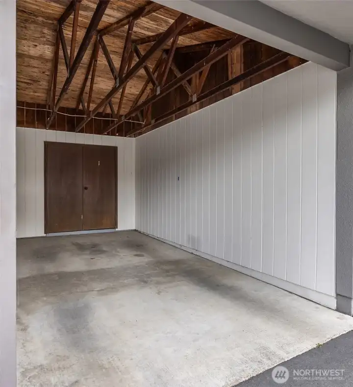 Park in the closest #1 spot under the carport with a storage locker behind.
