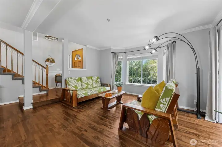 A bright and relaxing lounge space filled with natural light and designed for comfort.