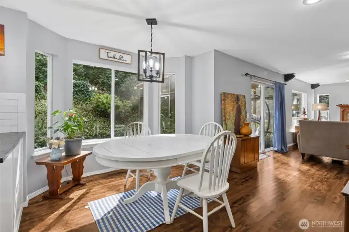 This inviting nook connects the kitchen and living room while providing easy access to the outdoor living area.