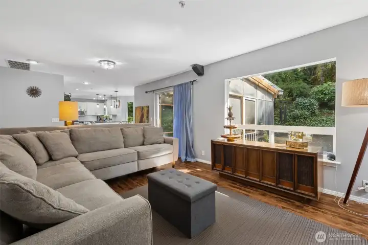 A bright and inviting living room, perfect for relaxing or entertaining with family and friends.