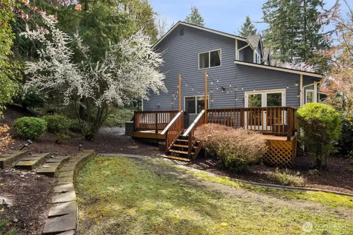 Relax and entertain on the expansive deck with a luxurious hot tub.