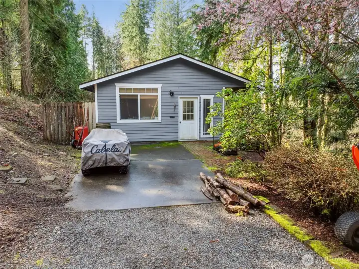 The property’s classic barn adds charm and versatility to the outdoor space.