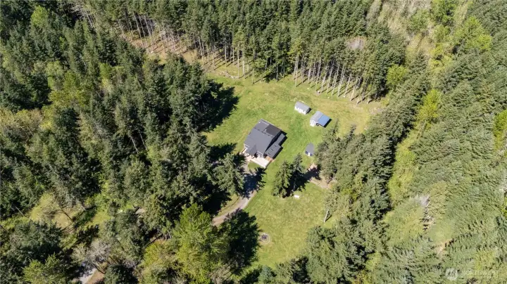 5 acres surrounded by forrest.