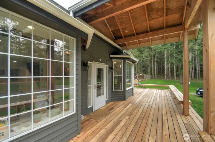 Wide front porch perfect for sitting on summer nights watching nature